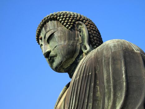 Detail of the Giant buddha statue (Daibutsu) at Kamakura city, Japan