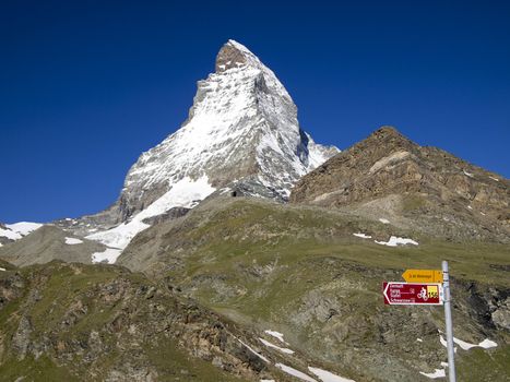 Matterhorn the Switzerland symbol with Swiss Mobility sign post