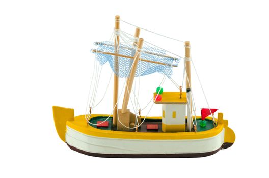 Wooden boat ship model decoration isolated on white. Handmade object.