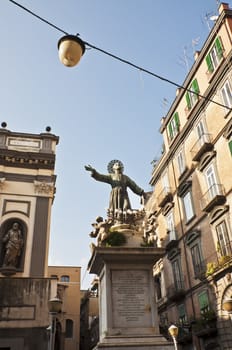 statue and buildings in San Lorenzo, Naples, Italy