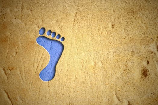 footprint drawing of blue sand, empty space for text