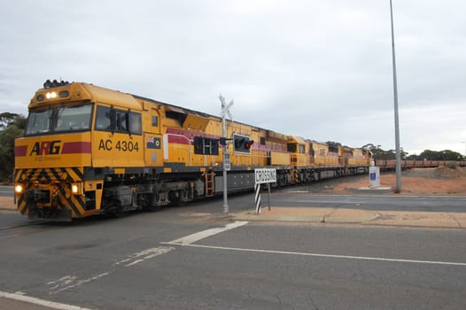 Train crossing highway in Western Australia