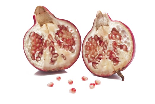 Ripe pomegranate fruit isolated on white background