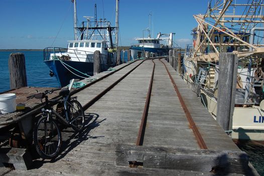 Town jetty with rails and bycicle, South Australia