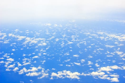 view from above of cloud and ocean