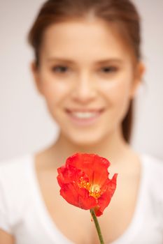 picture of beautiful woman with red flower