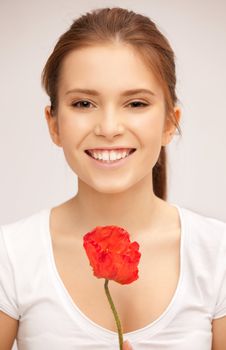 picture of beautiful woman with red flower