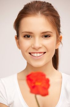 picture of beautiful woman with red flower