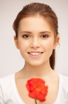 picture of beautiful woman with red flower