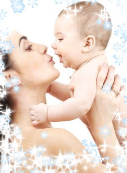 picture of happy mother with baby and snowflakes