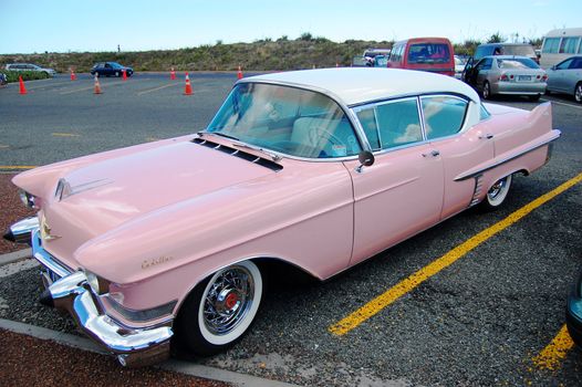 Pink retro car at parking, New Zealand