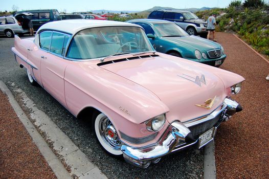 Pink retro car at parking, New Zealand