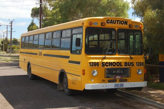 Yellow school bus at the parking, South Australia