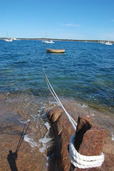 Rail jetty boat with rope, Port Lincoln, South Australia