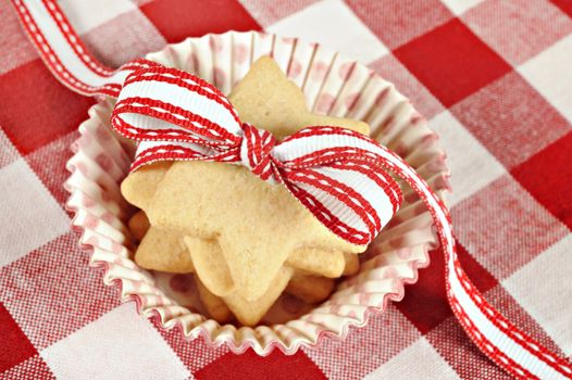 Star shaped cookies with red ribbon