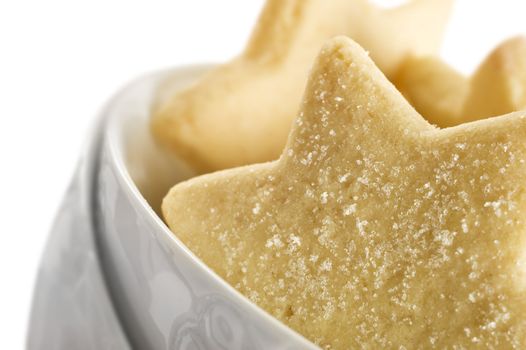 Star shaped cookies in a white bowl