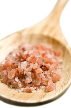 Pure himalayan salt on a wooden spoon