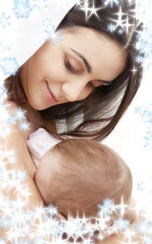 picture of happy mother with baby and snowflakes