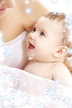 picture of happy mother with baby with snowflakes