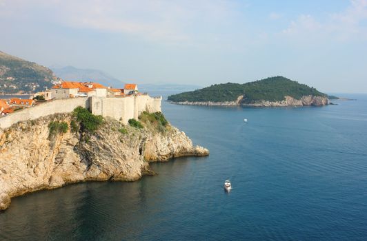 Panoramic view over the bay toward the old part of Dubrovnik and island Lokrum in Adriatic Sea.