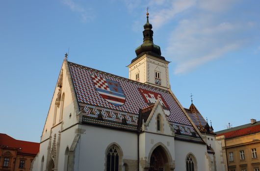Beautifull Saint Mark Church in Upper town in Zagreb, shot in the warm light of the sunset.