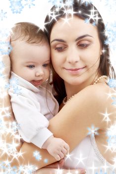 picture of happy mother with baby and snowflakes