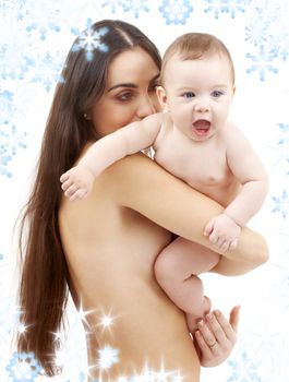 picture of happy mother with baby and snowflakes