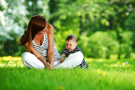 mother and child on grass