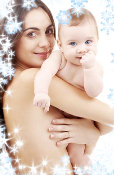 picture of happy mother with baby and snowflakes