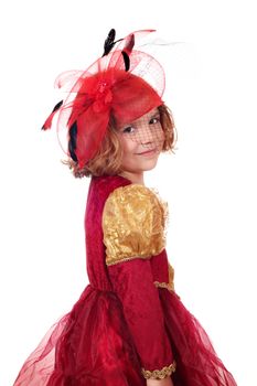 little girl in golden and red dress posing