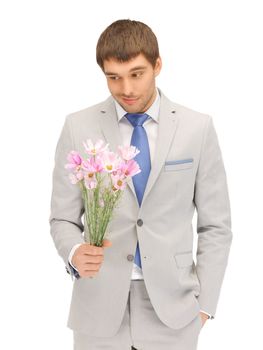 picture of handsome man with flowers in hand