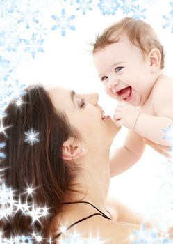 picture of happy mother with baby and snowflakes