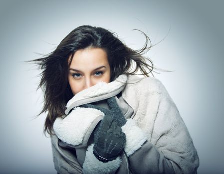 portrait of girl with Flying hair and winter clothing