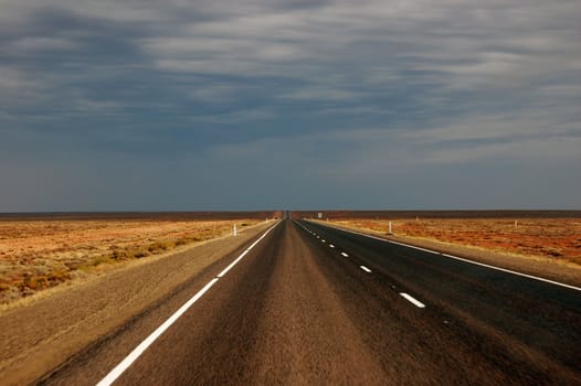 Straight road somewhere in outback of Australia