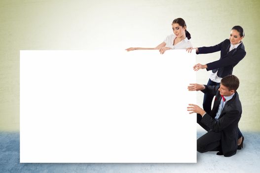 small group of people holding a blank banner, place for text