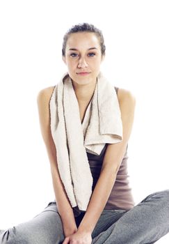 Young Woman In Fitness Clothing Resting After Exercise