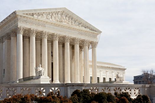 Facade of US Supreme court in Washington DC on sunny day