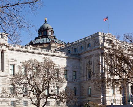 Carved front of Library of Congress Washington DC with dome over reading room