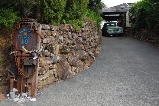 Retro car at cottage, Waiheke Island, nearby Auckland, New Zealand