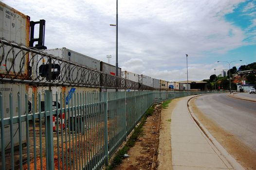 Fence of Port Moresby port, industrial area of the city, Papua New Guinea