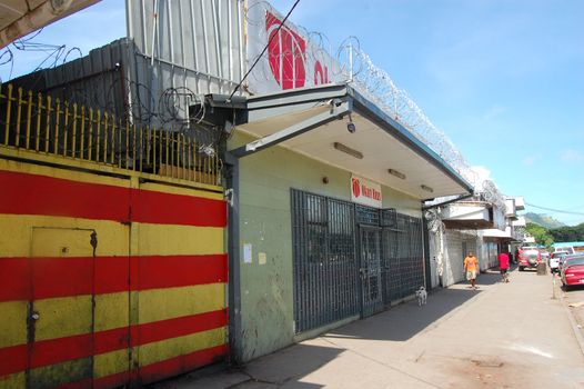 Street with closed stores in Port Moresby, Papua New Guinea