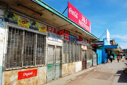 Street with closed stores in Port Moresby, Papua New Guinea