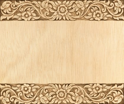 Pattern of flower carved frame on wood background