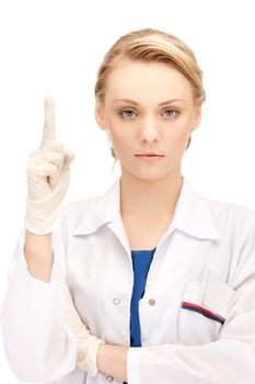 attractive female doctor with her finger up