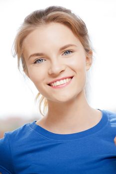 picture of happy and smiling teenage girl outdoors