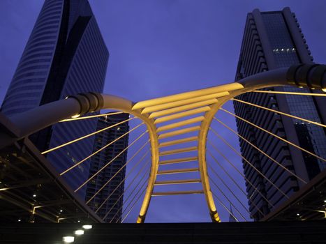 pubic skywalk at bangkok downtown square night in business zone