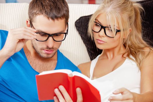 bright picture of couple at home with book