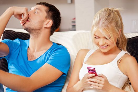 bright picture of couple at home with cellphone