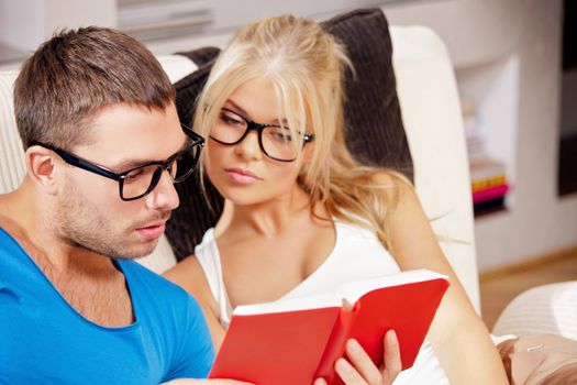 bright picture of couple at home with book