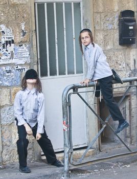 JERUSALEM - OCTOBER 06 2011 : Jewish ultra orthodox children in the " Mea Shearim" neighborhood in Jerusalem Israel.